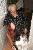 Click here to see the picture (crete250501_29_rethymno_oldwoman_cat.jpg)